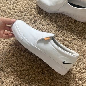 Nike slip ons size 8 NEVER WORN
